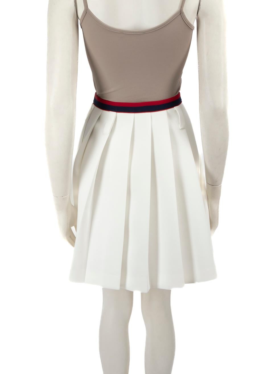 Mini falda plisada blanca Miu Miu Talla L Gris en venta