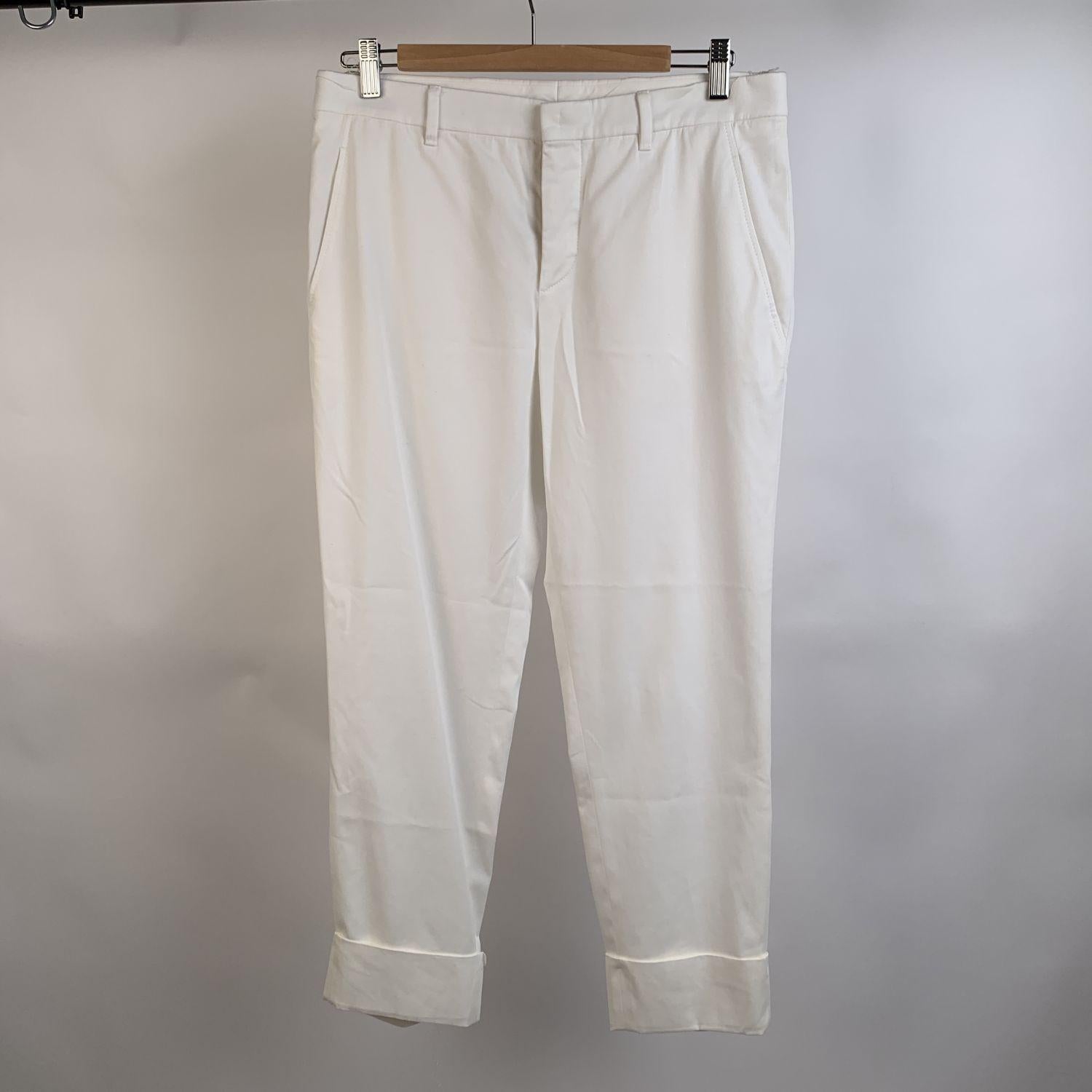 Miu Miu white stretch cotton trousers. Front button and zip closure. Belt loops. Rolled hem. Hips pockets. Composition: 96% Cotton, 4% Elastane. Size 40 IT (it should correspond to a SMALL size)



Details

MATERIAL: Cotton

COLOR: White

MODEL:
