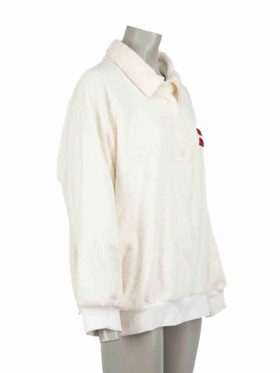 CONDITION is Very good. Hardly any visible wear to jumper is evident on this used Miu Miu designer resale item.
 
Details
White
Cotton
Oversized sweatshirt
Terry cloth texture
Logo embroidery on front and back
Polo collar
Front quarter button up