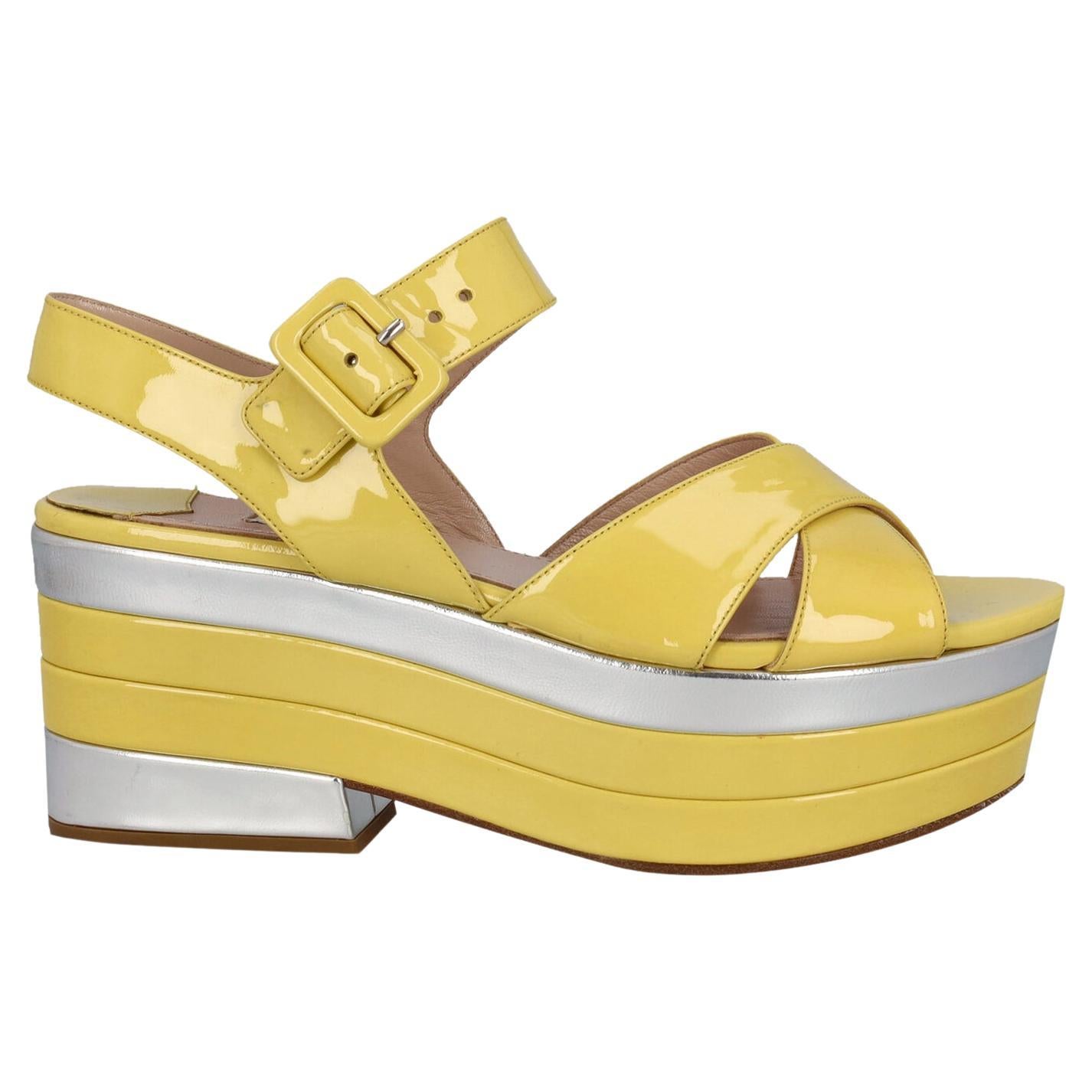 Miu Miu women's bow embellished patent leather flat pumps in yellow  size 36 used