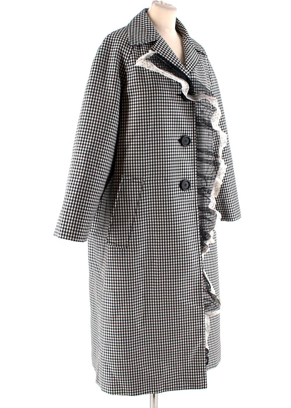 Miu Miu Wool & Mohair Gingham Coat with Lace Detail 

-Perfect for a beautiful winter day 
-Luxurious smooth wool and mohair texture 
-Classic style with a twist
-Lace ruffle detail to the right  
-Raglan sleeve 
-2 front pockets
-Spare button