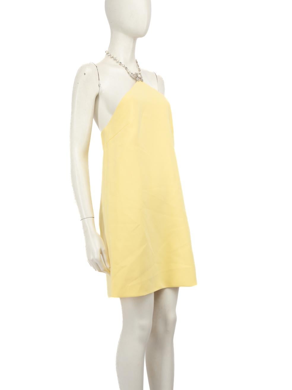 CONDITION is Very good. Minimal wear to dress is evident. Minimal wear to left side with a discolouration mark towards the side seam on this used Miu Miu designer resale item.
 
 Details
 
 
 Yellow
 
 Synthetic
 
 Mini Dress
 
 Backless
 
