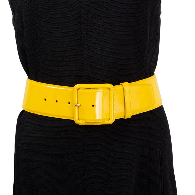 100% authentic Miu Miu waist belt in yellow patent leather. Has been worn and shows a some small spots on the leather. Overall in excellent condition. Comes with dust bag.

Measurements
Tag Size	70
Width	6cm (2.3in)
Fits	64cm (25in) to 74cm