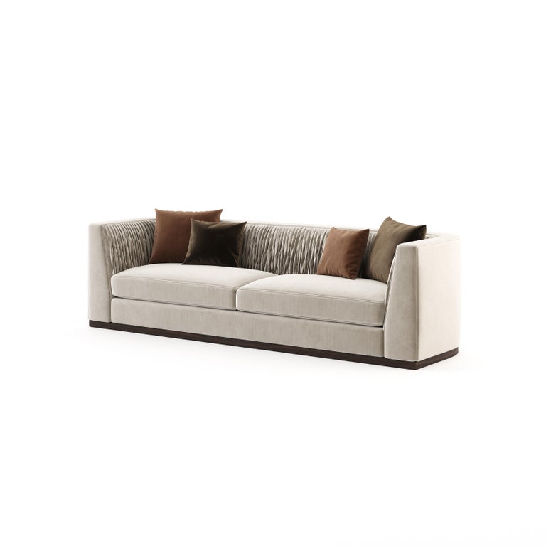 Miuzza sofa brings comfort, happiness, and glamour to your living room. This contemporary coach is the new focal point of interior design projects. Inspired by the Art Deco silhouettes, this sofa is versatile enough to be well-paired with just about