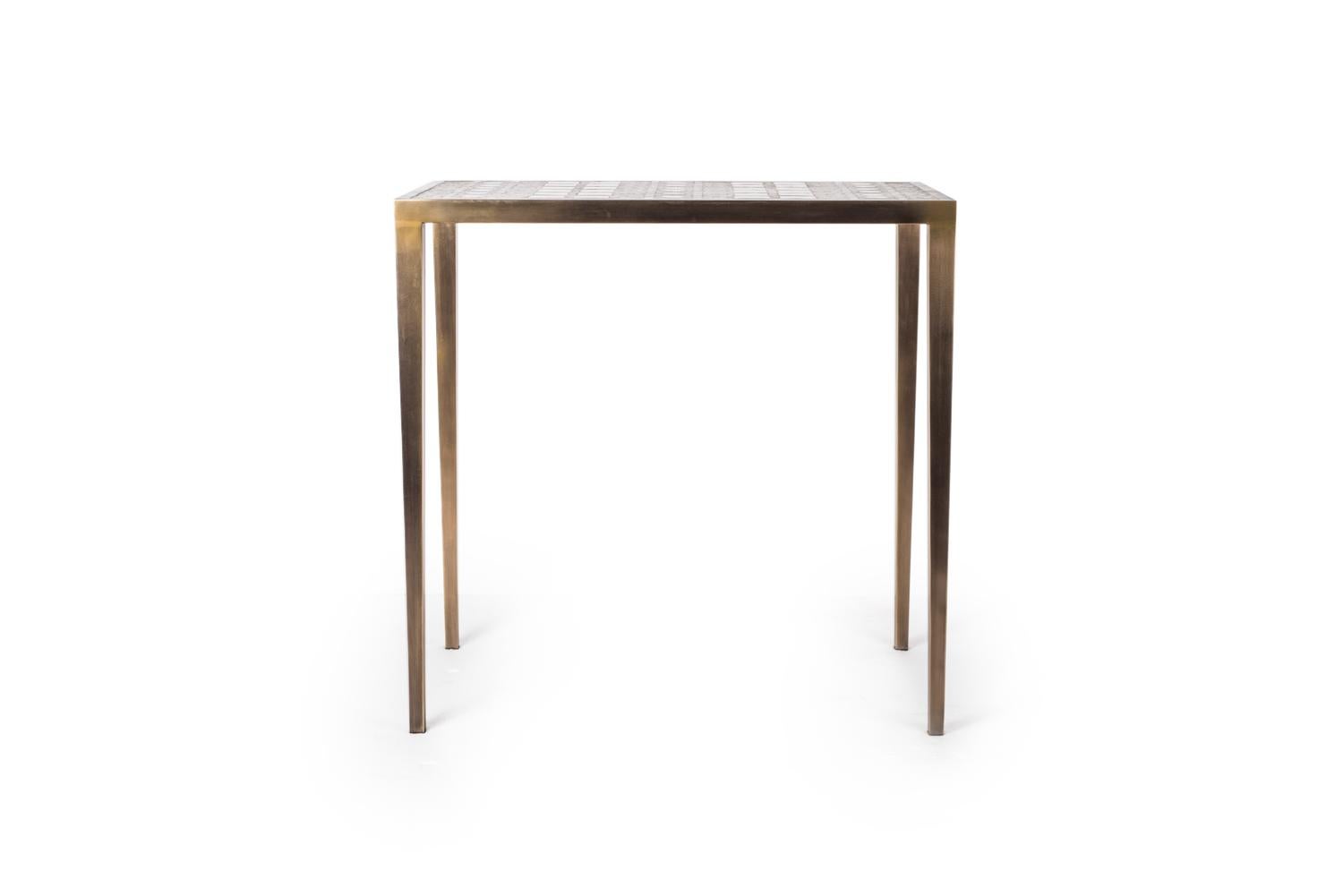 The mix media nesting side table in large is part of a series of nesting side tables (sold separately) . One can purchase the tables on their own or buy them as a set to create elegant & geometric shapes. This piece demonstrates the incredible