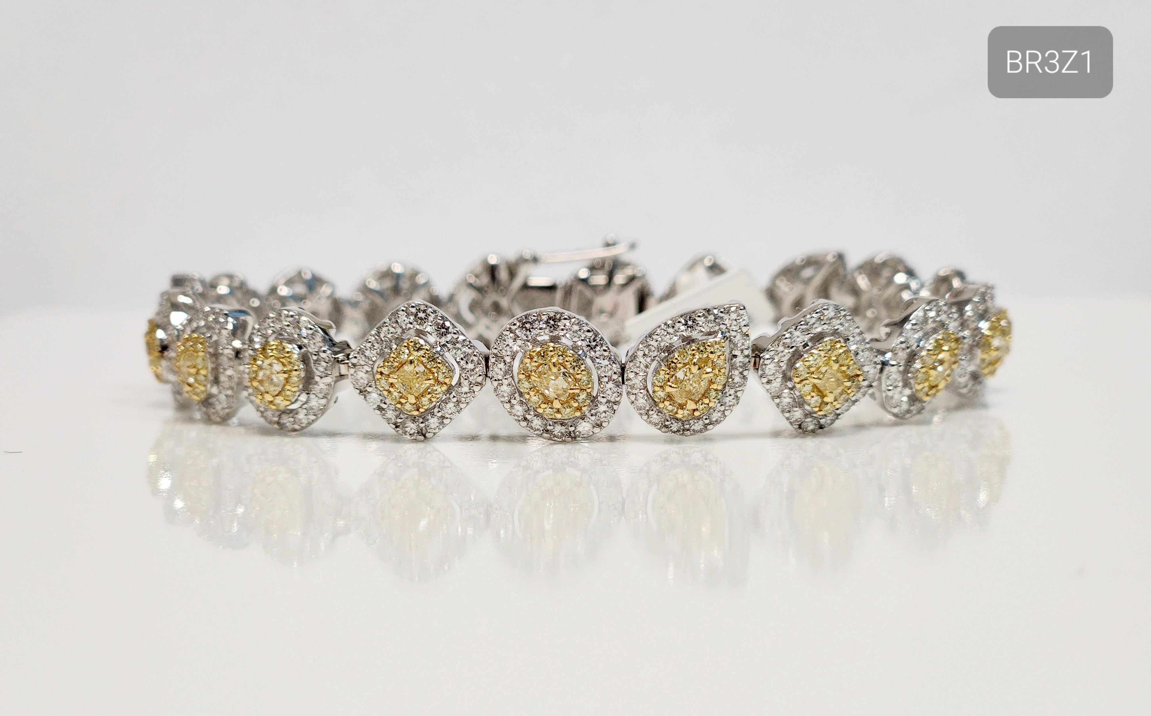 Immerse yourself in the captivating radiance of this Mix Shape Yellow Diamond Line Bracelet. Crafted with utmost precision and artistry, this bracelet features a collection of dazzling 1.74 carats yellow diamonds in various shapes, including pear,