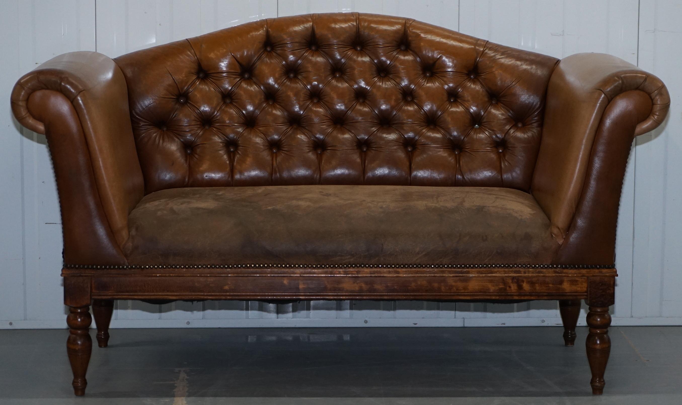We are delighted to offer for sale this interesting mixed brown leather Chesterfield buttoned club sofa with suede leather base.

A nicely sized decorative piece with quite a sculptural frame, the leather on the arm’s front panels and back and