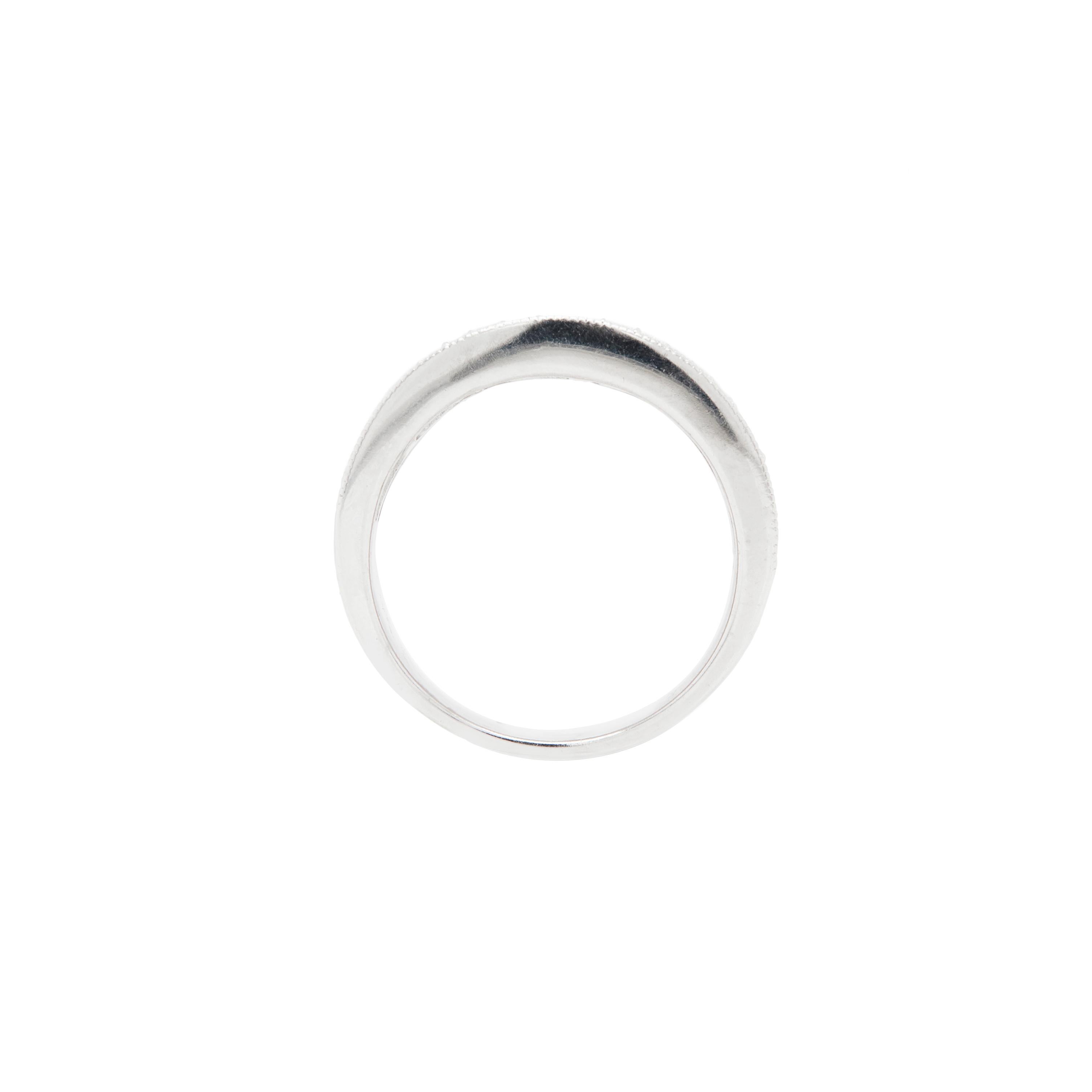Masterfully crafted in sleek, luxurious 14 carat white gold, this dress ring is a true showstopper.

The exquisite piece is beautifully adorned with a dazzling array of meticulously set diamonds, including round brilliant and baguette cuts,