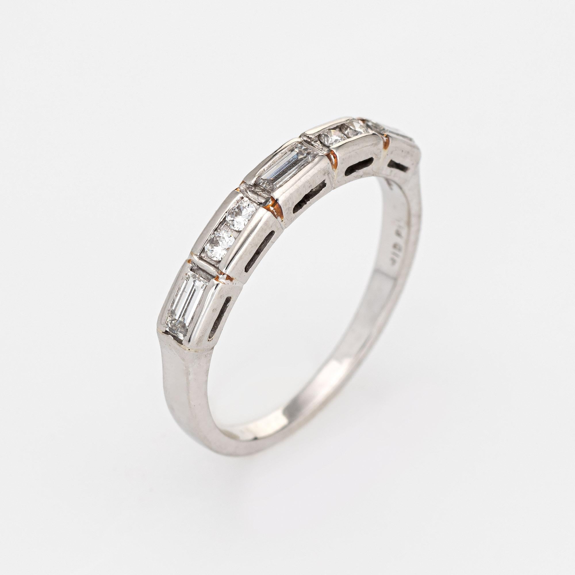 Stylish vintage mixed cut diamond band (circa 1950s to 1960s) crafted in 900 platinum.

Round brilliant & straight baguette cut diamonds total an estimated 0.20 carats (estimated at H-I color and VS2-SI1 clarity). 

The simple and elegant band is