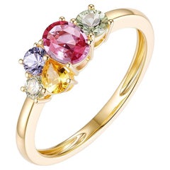 Anello con diamante e zaffiro fantasia a taglio misto in oro giallo 14 carati