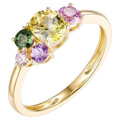 Anello con diamante e zaffiro fantasia a taglio misto in oro giallo 14 carati
