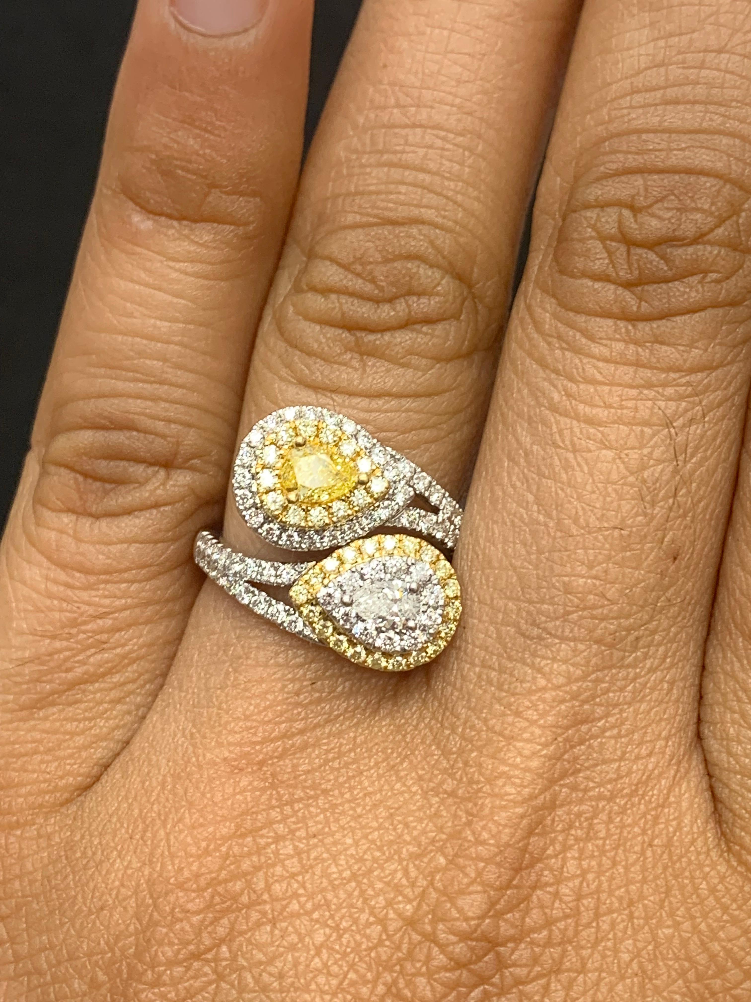 The stunning forever-together Toi et Moi ring features 1 pear shape yellow diamond weighing 0.34 carat and 1 pear shape white diamond weighing 0.18 carat in total. 103 accent Brilliant cut Diamonds surrounding the center stones from east to west