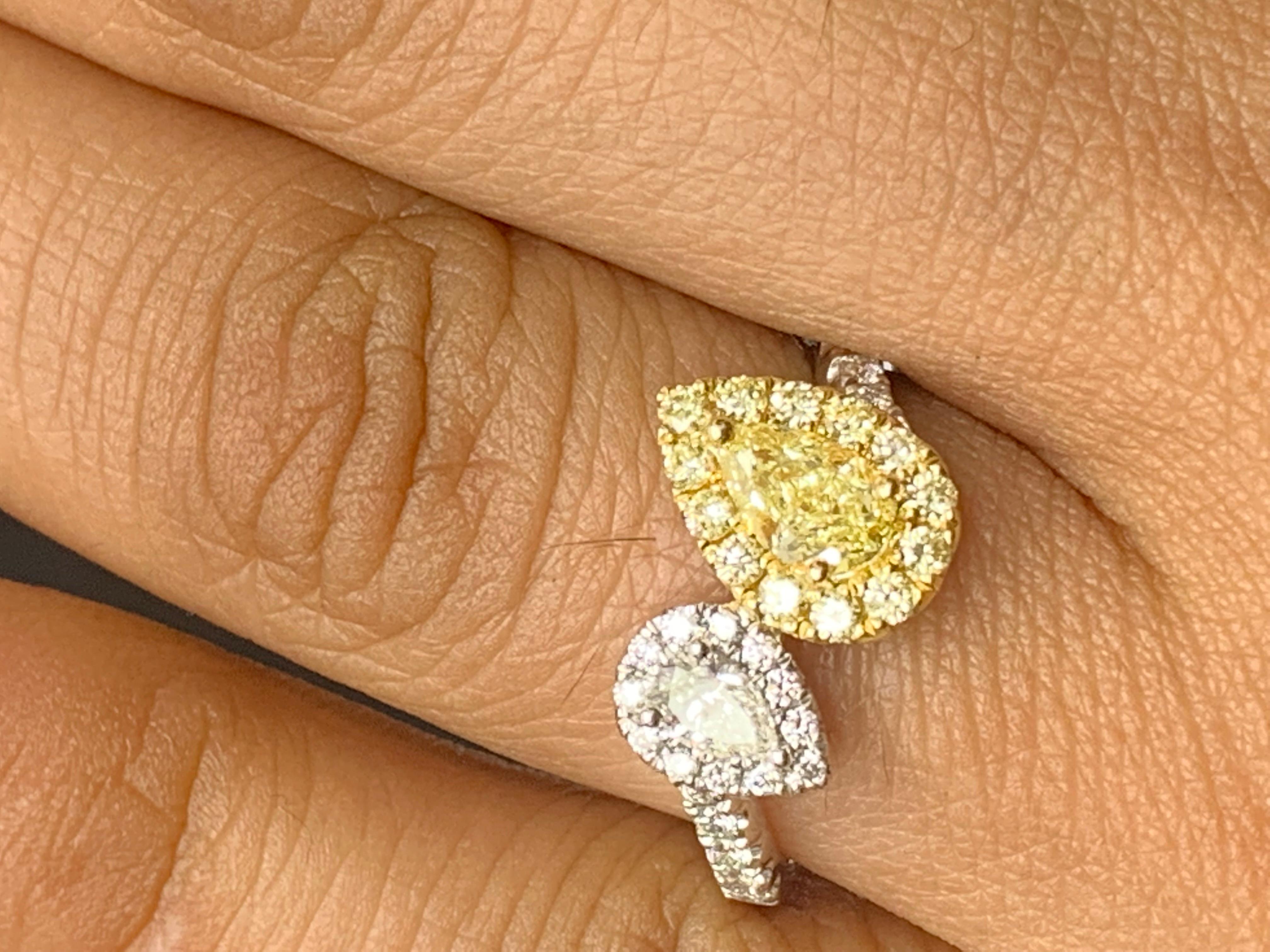 The stunning forever-together Toi et Moi ring features 1 pear shape yellow diamond weighing 0.51 carat and 1 pear shape white diamond weighing 0.18 carat in total. 35 accent Brilliant cut Diamonds surrounding the center stones from east to west