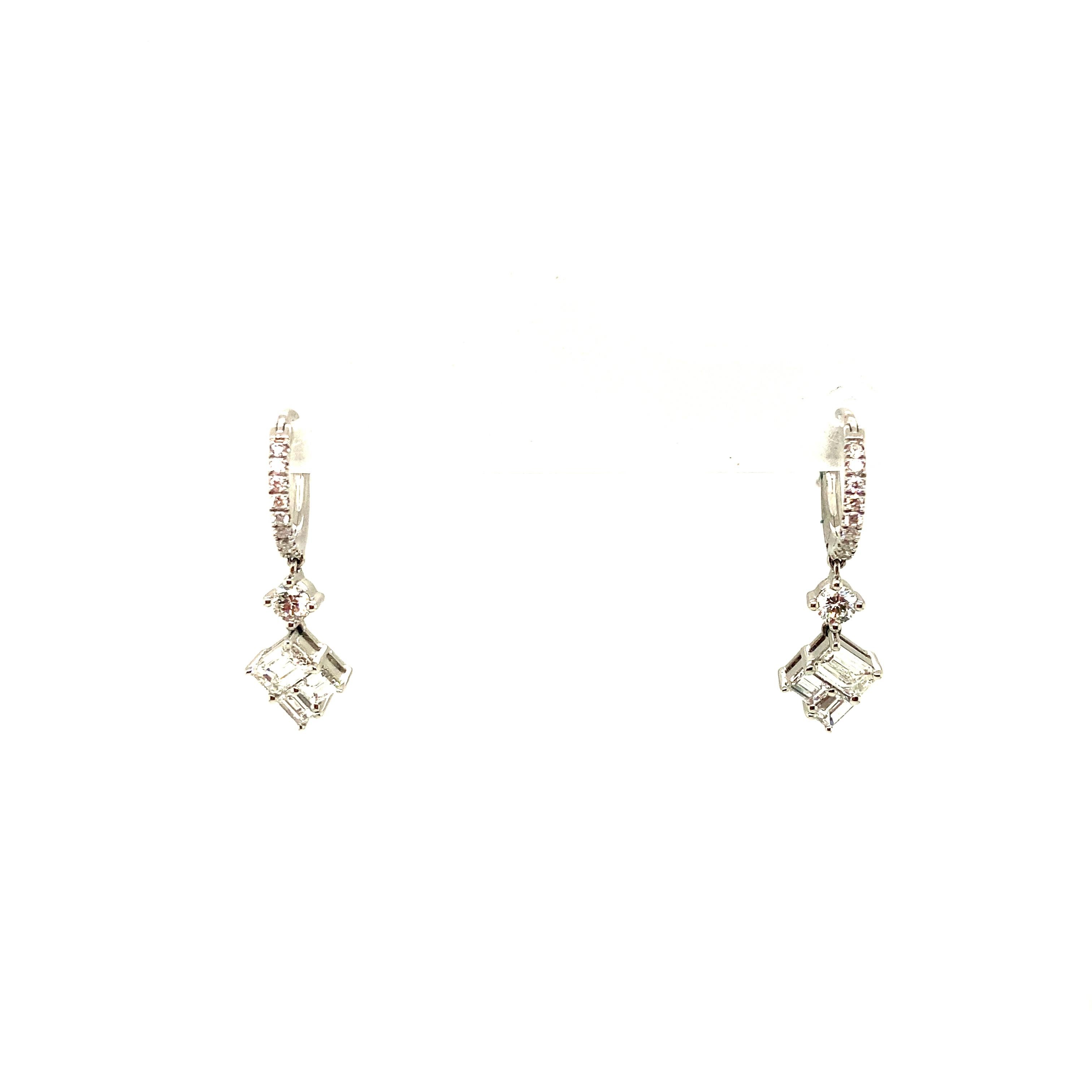 0.86 Carat Mixed-Cut White Diamond and White Gold Dangle Earrings:

A beautiful pair of earrings, it features round brilliant-cut diamonds weighing 0.25 carat, baguette cut diamonds weighing 0.26 carat, and emerald cut diamonds weighing 0.35 carat.