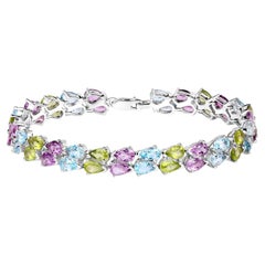 Pulsera de tenis de piedras preciosas mixtas Amatista Topacio Peridoto 23,4 quilates Plata