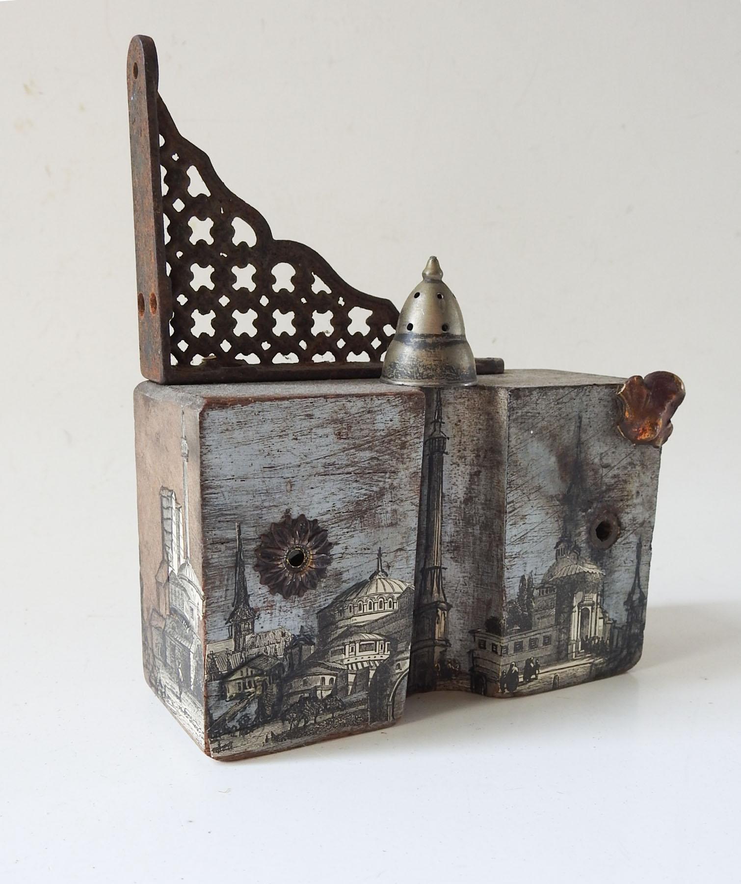 Small tabletop mixed media assemblage sculpture by Linda Thompson. Using all antique and vintage components. Wood casting mold from Alamo Ironworks for Swearingen Co. , antique architectural engravings, brass rosette, silverplate shaker top, cast
