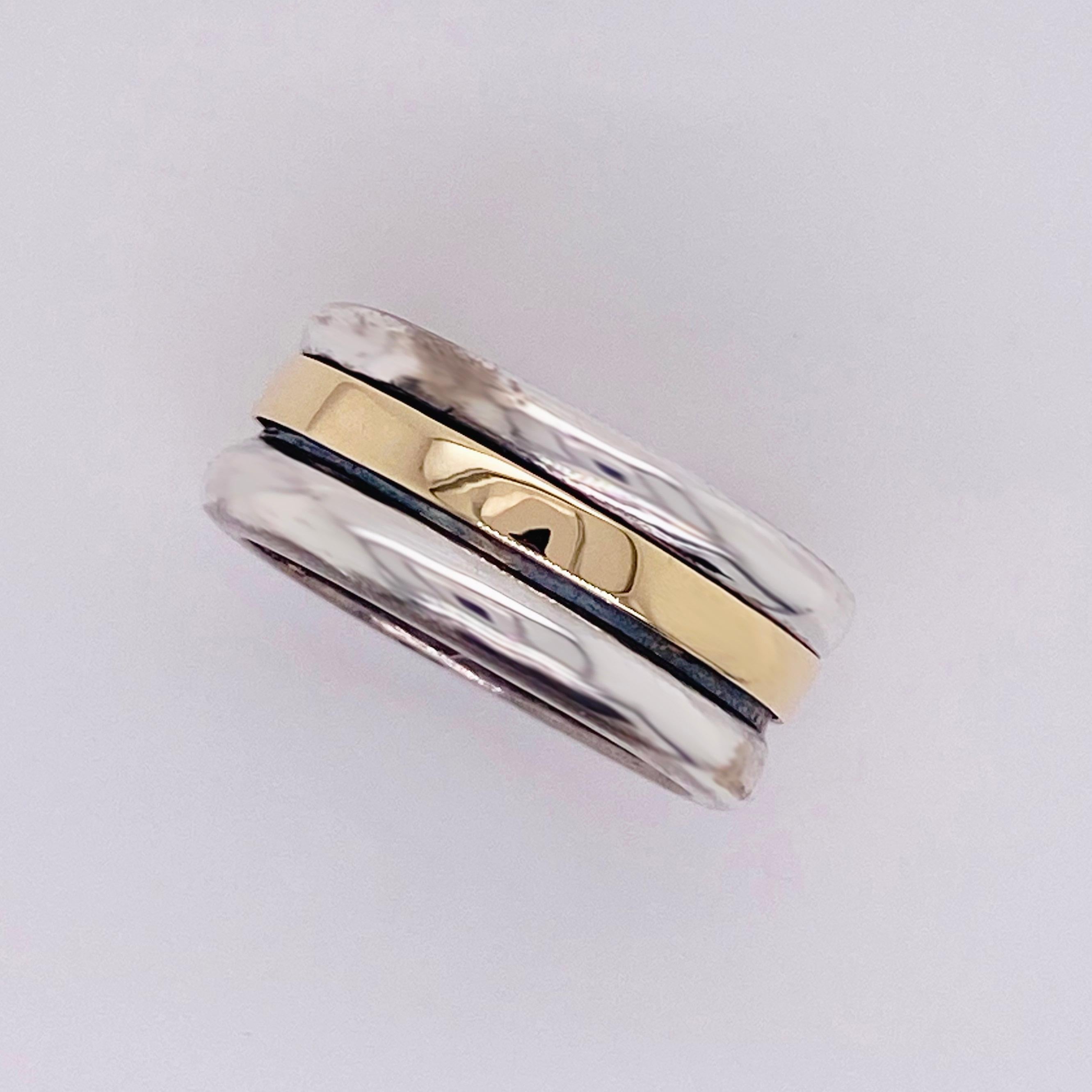 silver and gold spinner ring