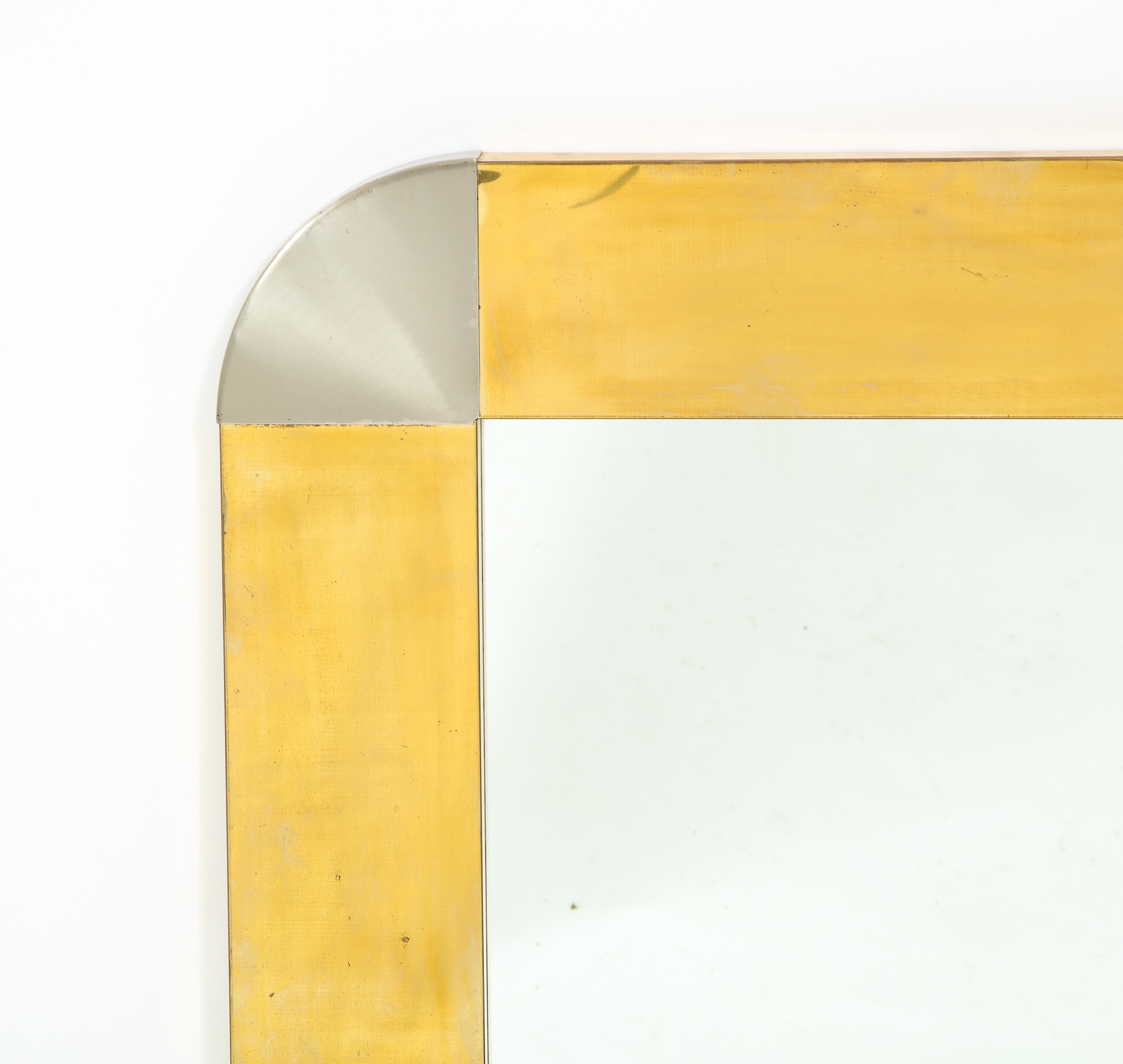 Miroir de C.I.C. en métaux mixtes, laiton et acier patiné avec verre d'origine.