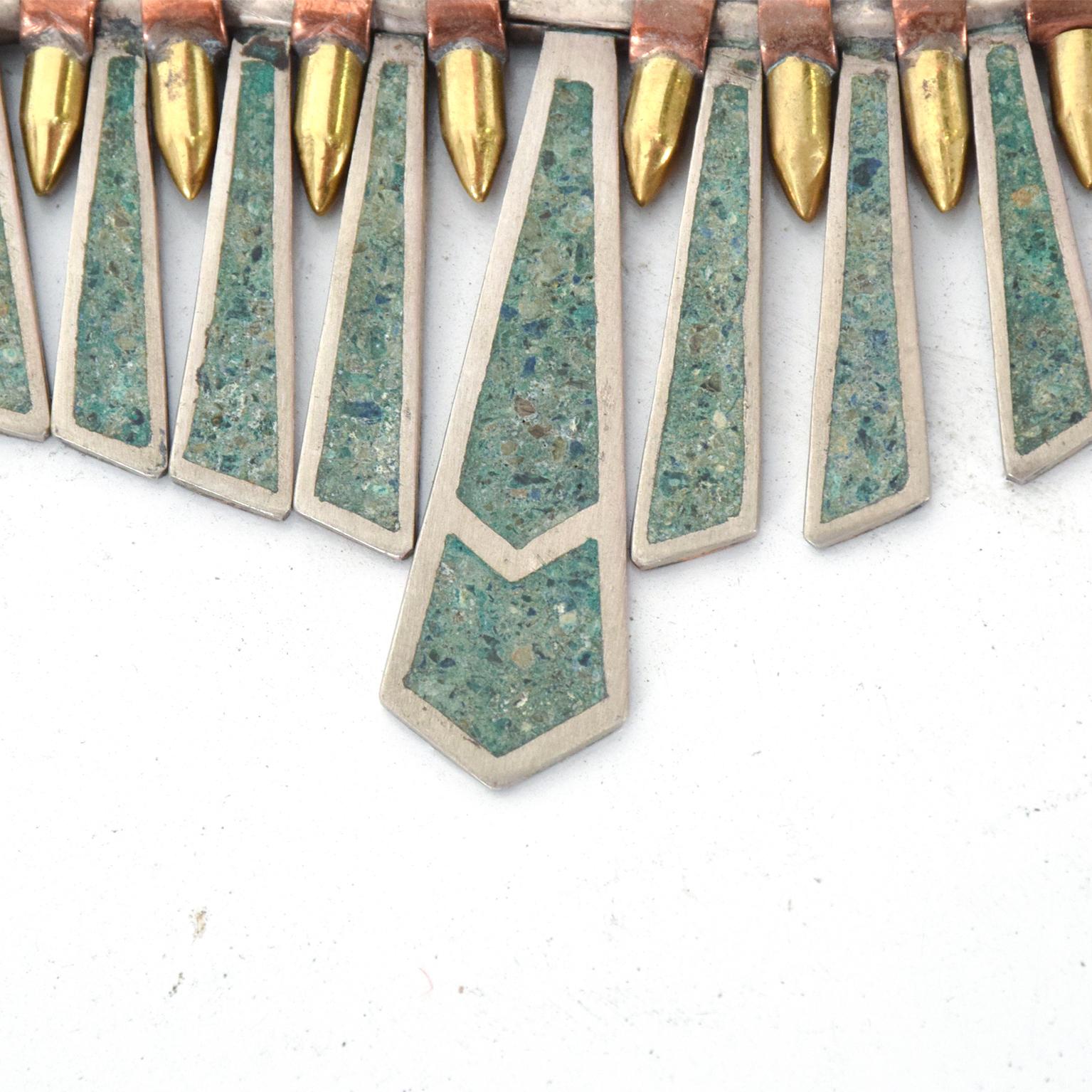 For your consideration: Vintage mosaic choker necklace in a fringe spike bib collar design, made in Mexico, circa 1960s.
Stunning Mexican modernism necklace Art in malachite metal mix
Unmarked. Similar to work of Los Castillo, designs of William