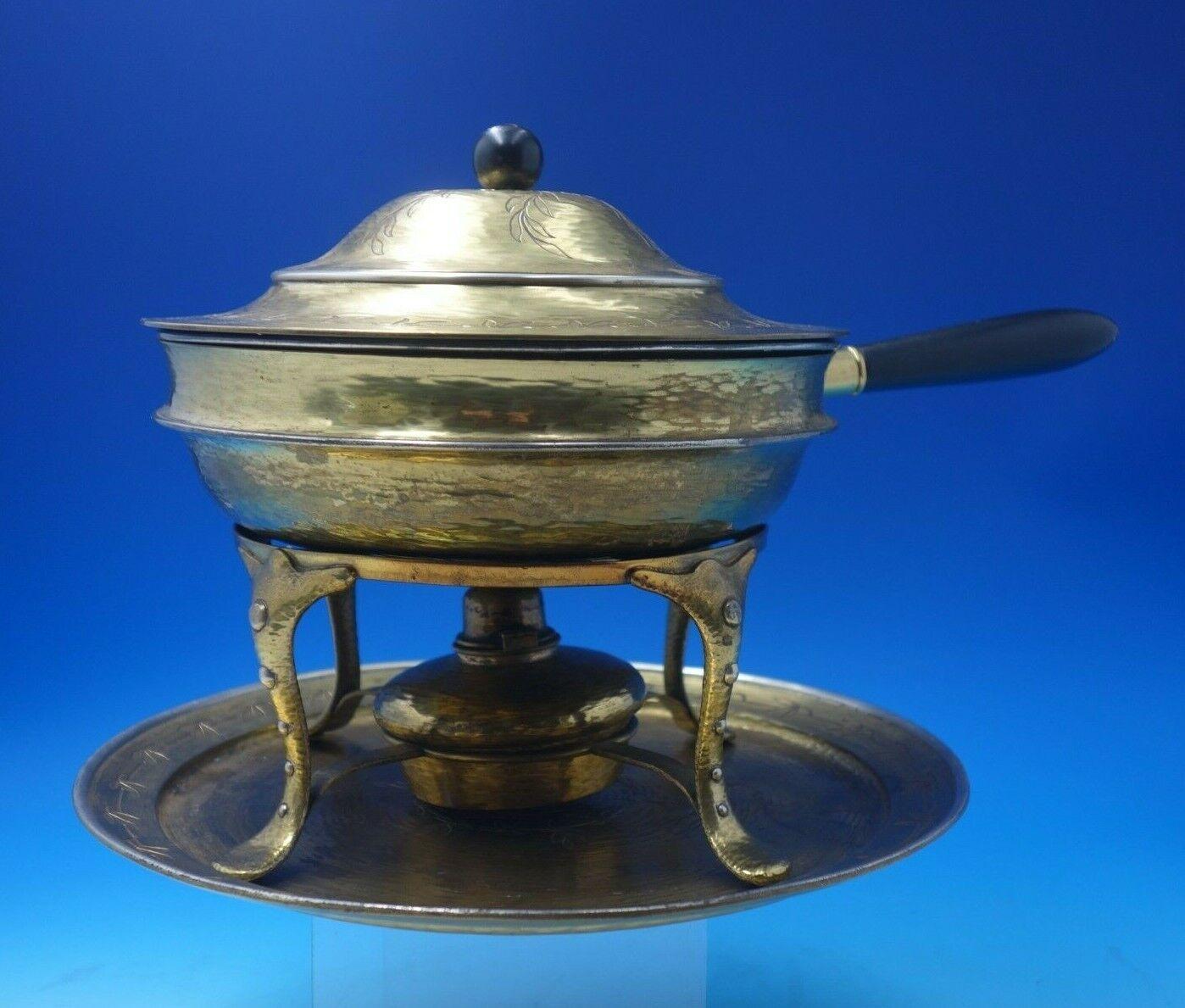 Mixed Metals by Tiffany and Co.

Extraordinary Mixed Metals by Tiffany and Co sterling silver (and other metals) chafing dish with underplate with 