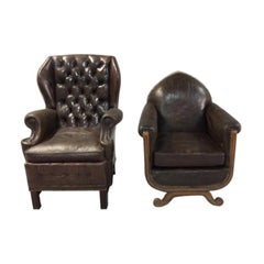 Mixed Pair of Antique Leather Arm Chairs