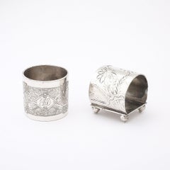 Mixed Pair of Silver Plate Napkin Rings with Chased Detailing