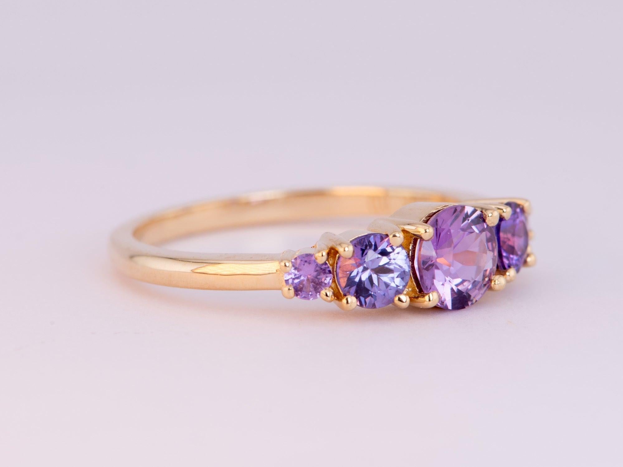 ♥ Mixed Sapphire 5-Stone Band 14K Gold
♥ Has 5 gorgeous pinkish purple sapphires! This color is rare and hard to find, let alone matching 5 stones that complement each other yet stand out each on its own!
♥ The item measures 5.2mm in length, 17mm in