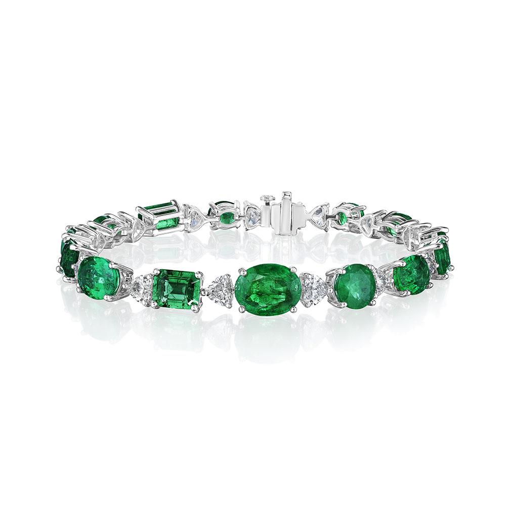 •	18KT White Gold
•	7” Long
•	Carat Weight: 20.44 Carats

•	Number of Green Emeralds: 15
•	Carat Weight: 15.74ctw

•	Number of Heart Shape Diamonds: 15
•	Carat Weight: 4.70ctw

•	A beautiful mix of round, oval, pear, cushion, and emerald cut green