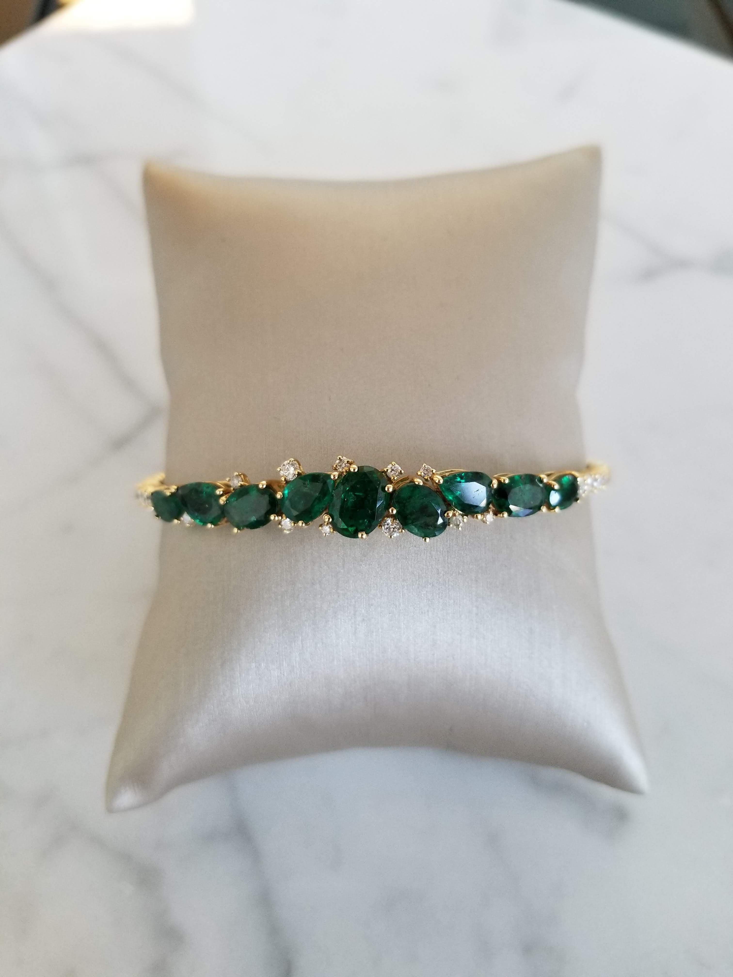 Flexible Diamond and Green Emerald Bracelet that can be dressed up and down! 
Fall in love with this beautiful piece!