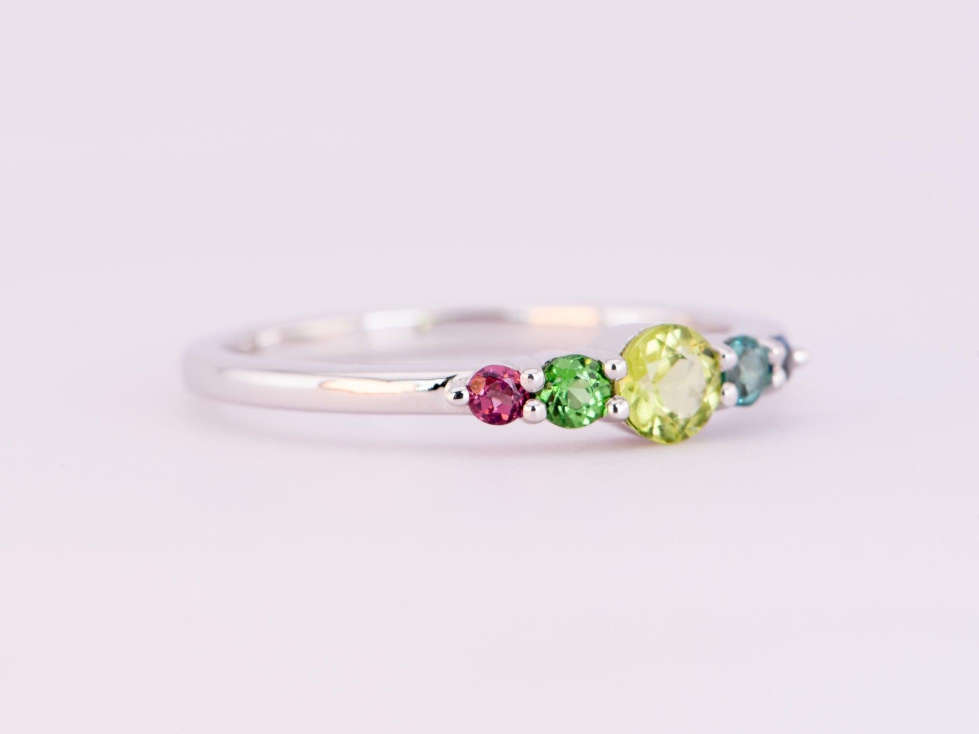 ♥ Mixed Tourmaline Wedding Band 14K Gold
♥ The item measures 4mm in length, 14mm in width, and 3.4mm in height.
♥ Material: 14K Gold
♥ Gemstone: Tourmaline, 0.52-0.65ct 
♥ Three rings available, each ring will receive free resizing up or down 1