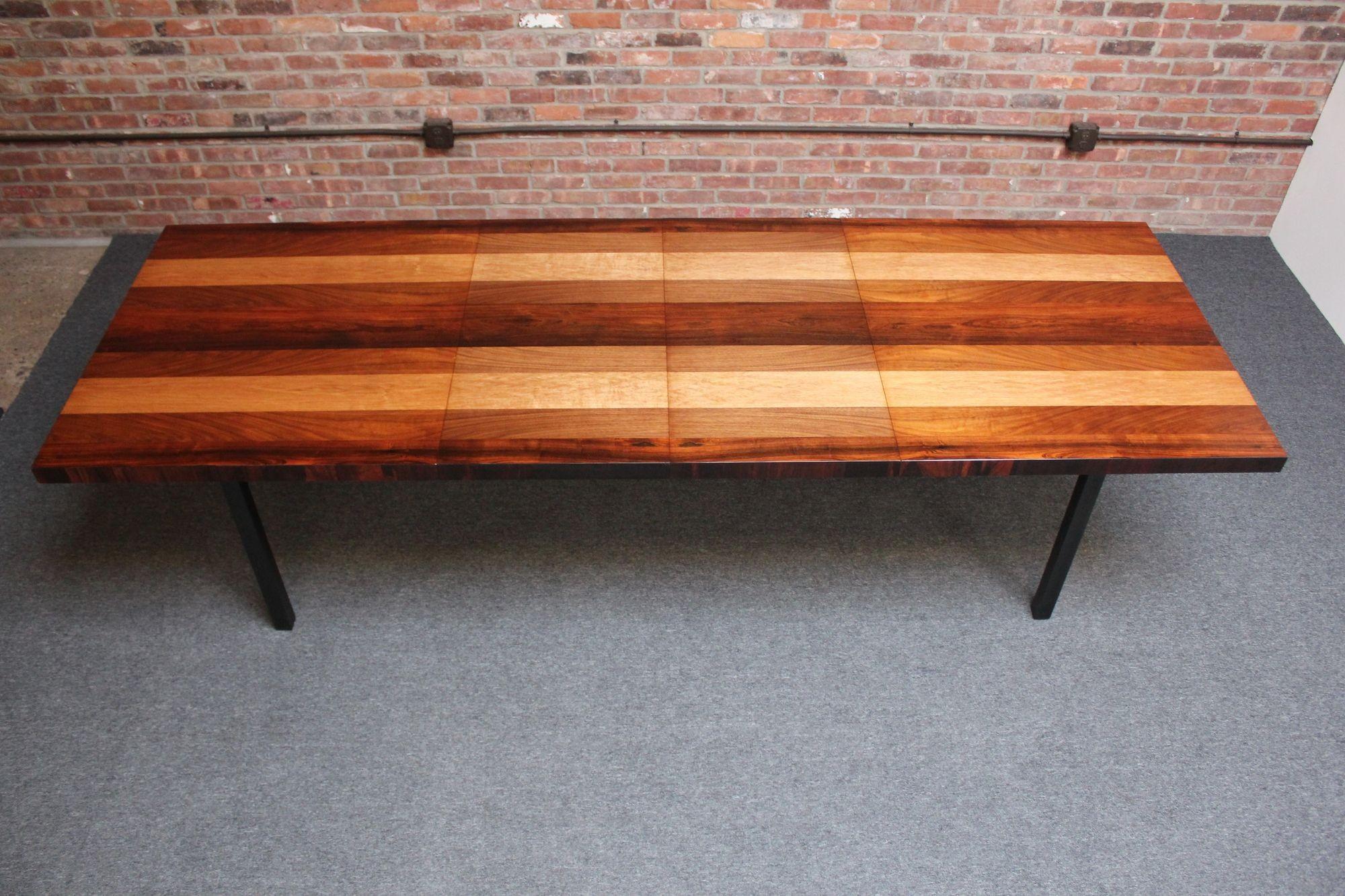 Mixed-woods dining table designed by Milo Baughman for Directional's 