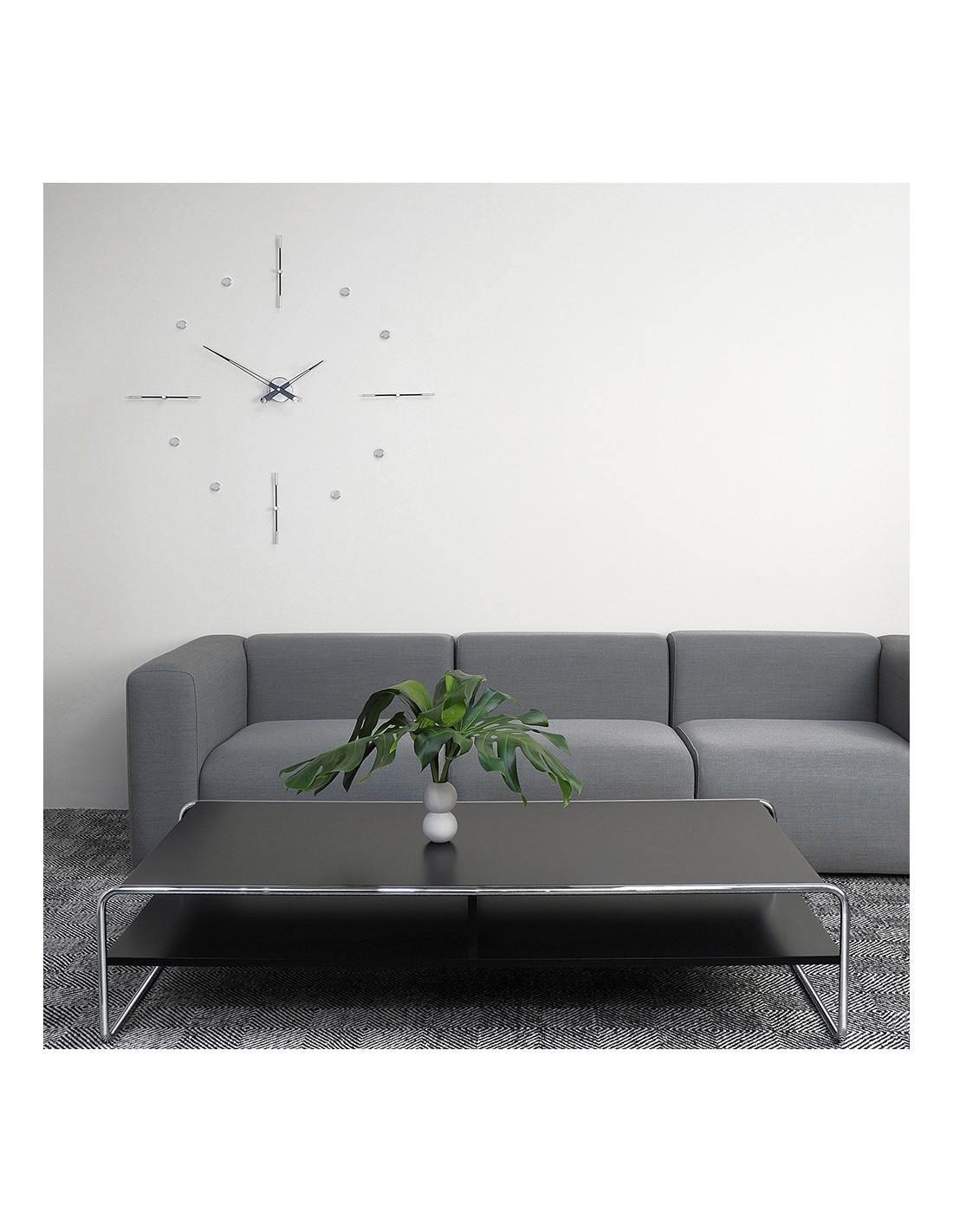 The Mixto N wall clock has an elegant and dynamic design , combining fine wood and chrome steel materials.
Mixto N wall clock : chromed brass and walnut, hands in walnut.
                                 chromed brass and wenge finish, hands in