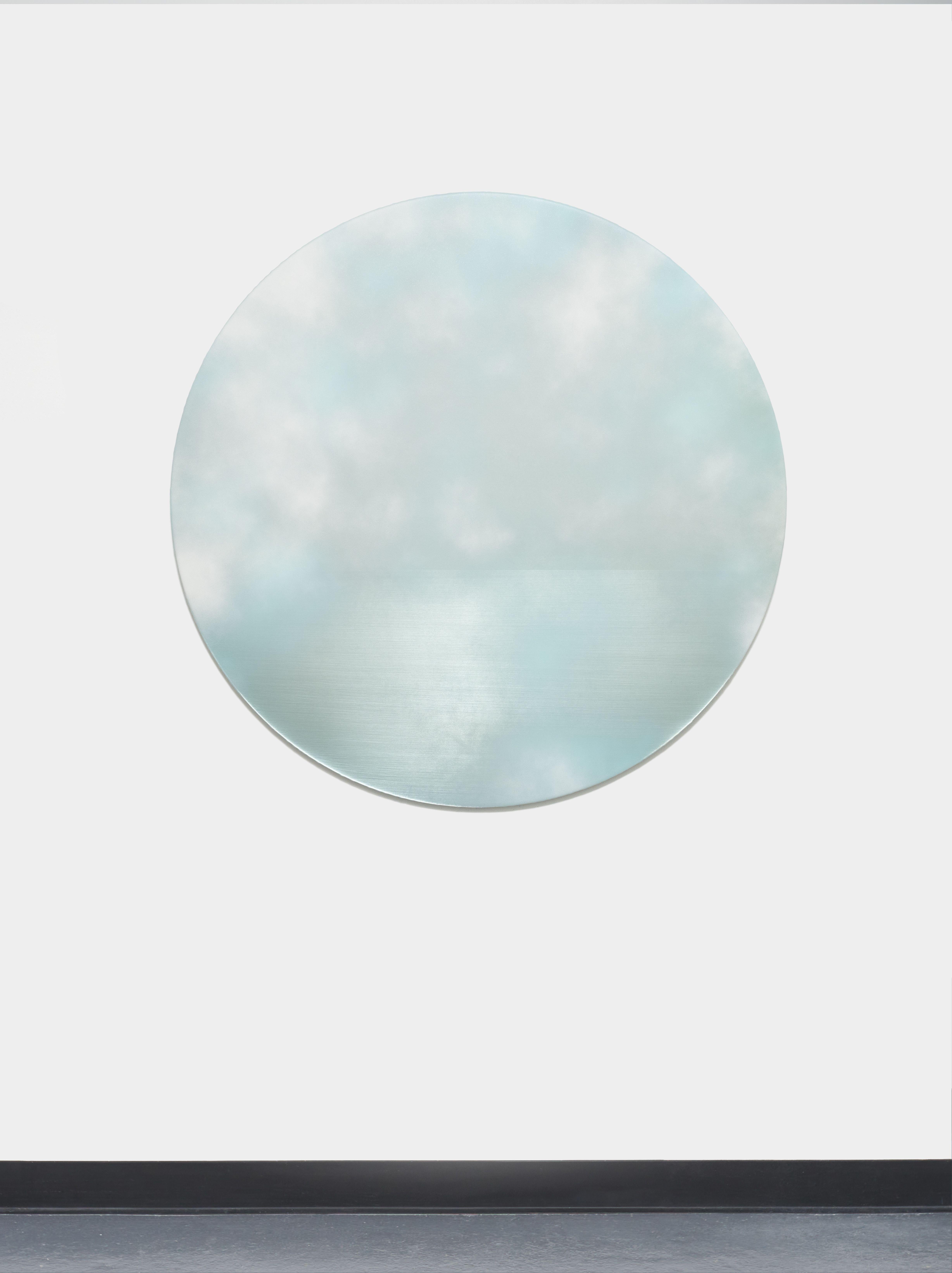 Reflective round painting of clouds in a pale blue sky For Sale 1