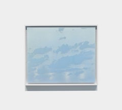 Quadro in metallo azzurro riflettente con nuvole e luna al tramonto