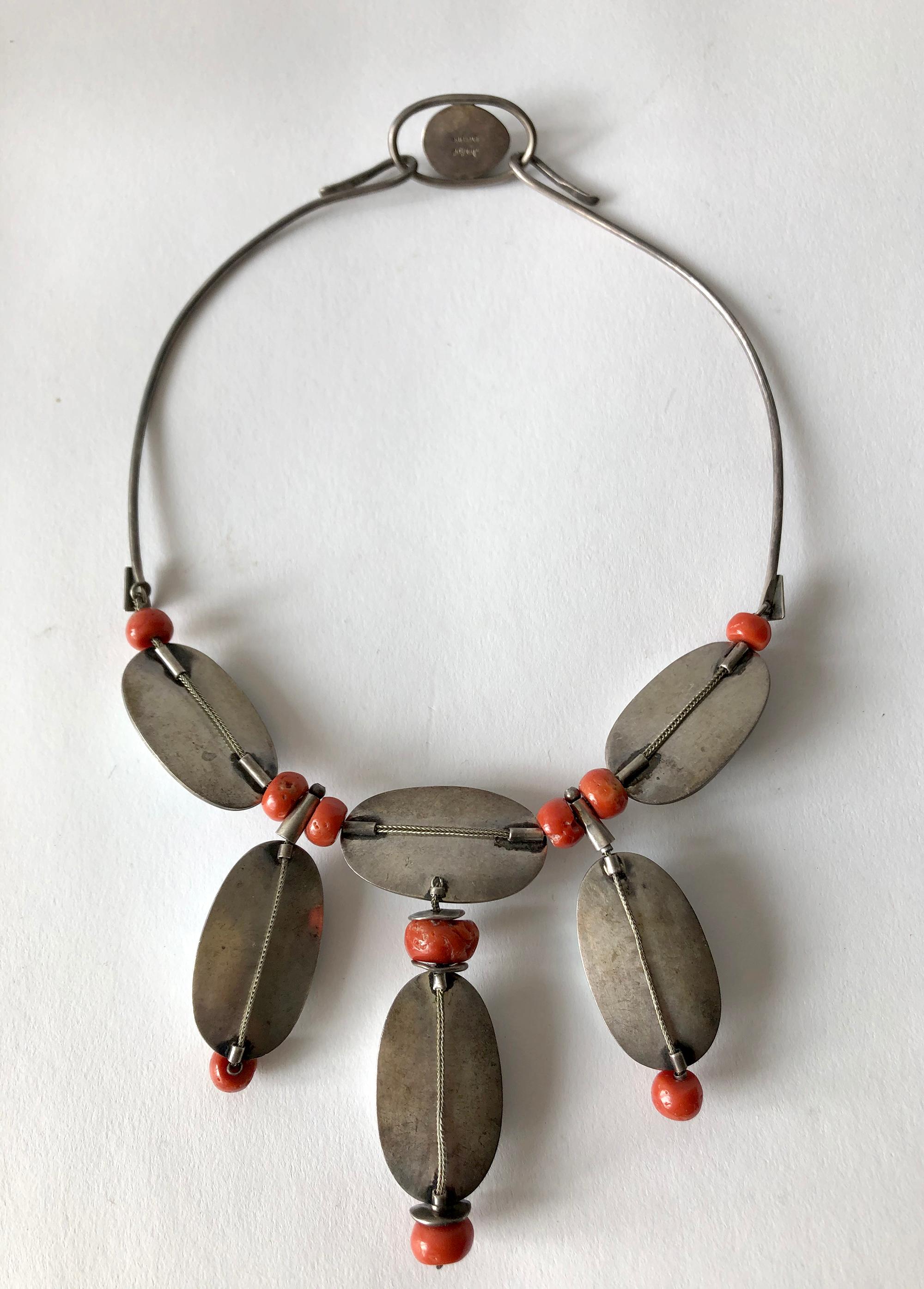 Mother of pearl and coral beaded necklace created by Miye Matsukata for Atelier Janiyé of Boston, Massachusetts. Necklace measures 17.5