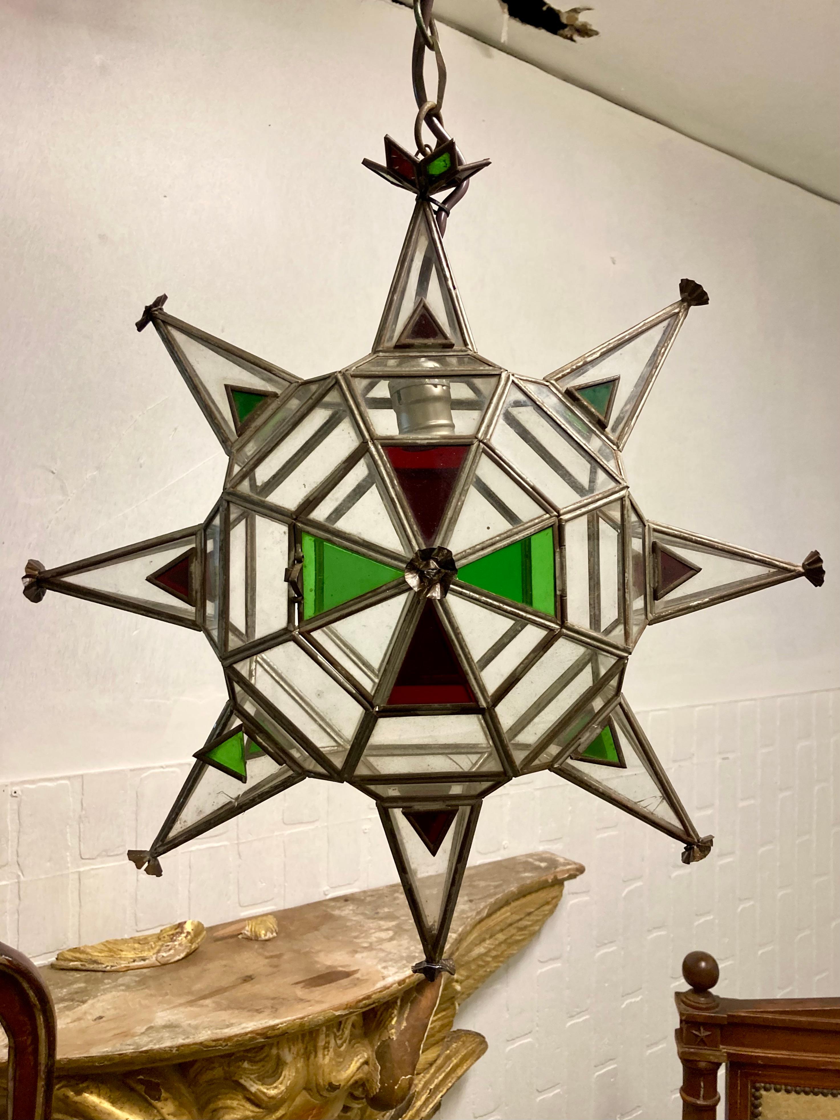 Beautiful Mizner style star hanging fixture. Add some architecture to your home.