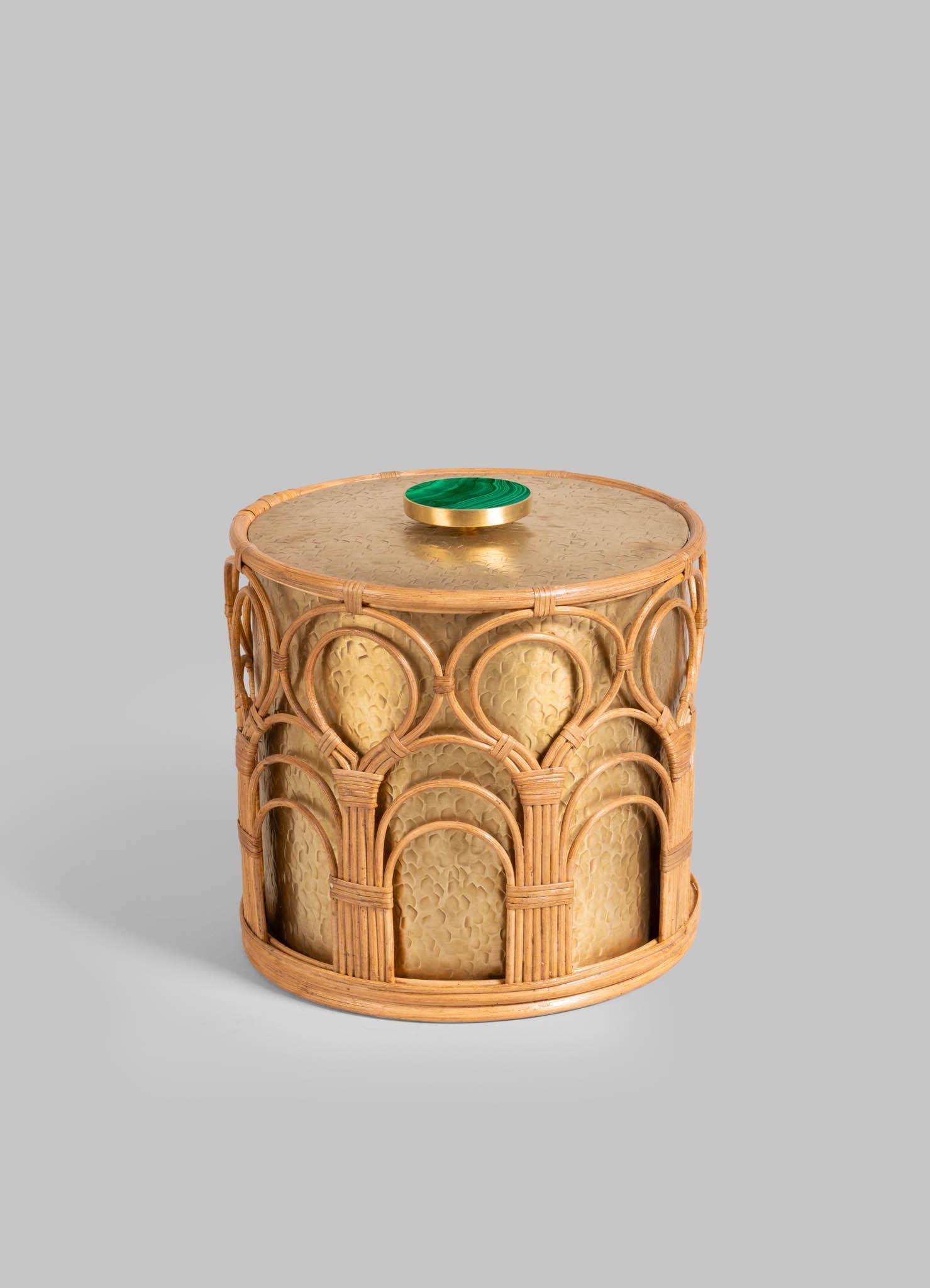 Mizoram Ice Bucket Large in Brass and Cane, Viya By Vikram Goyal

A classic pairing, reimagined. Robust cane becomes latticed second skin to the hand-beaten brass objects in an effortless collaboration. These barware accessories are crafted as