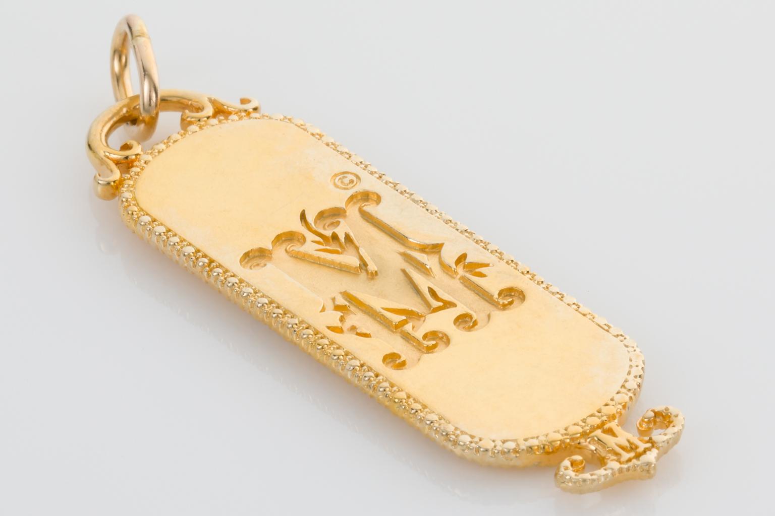 gold love pendant