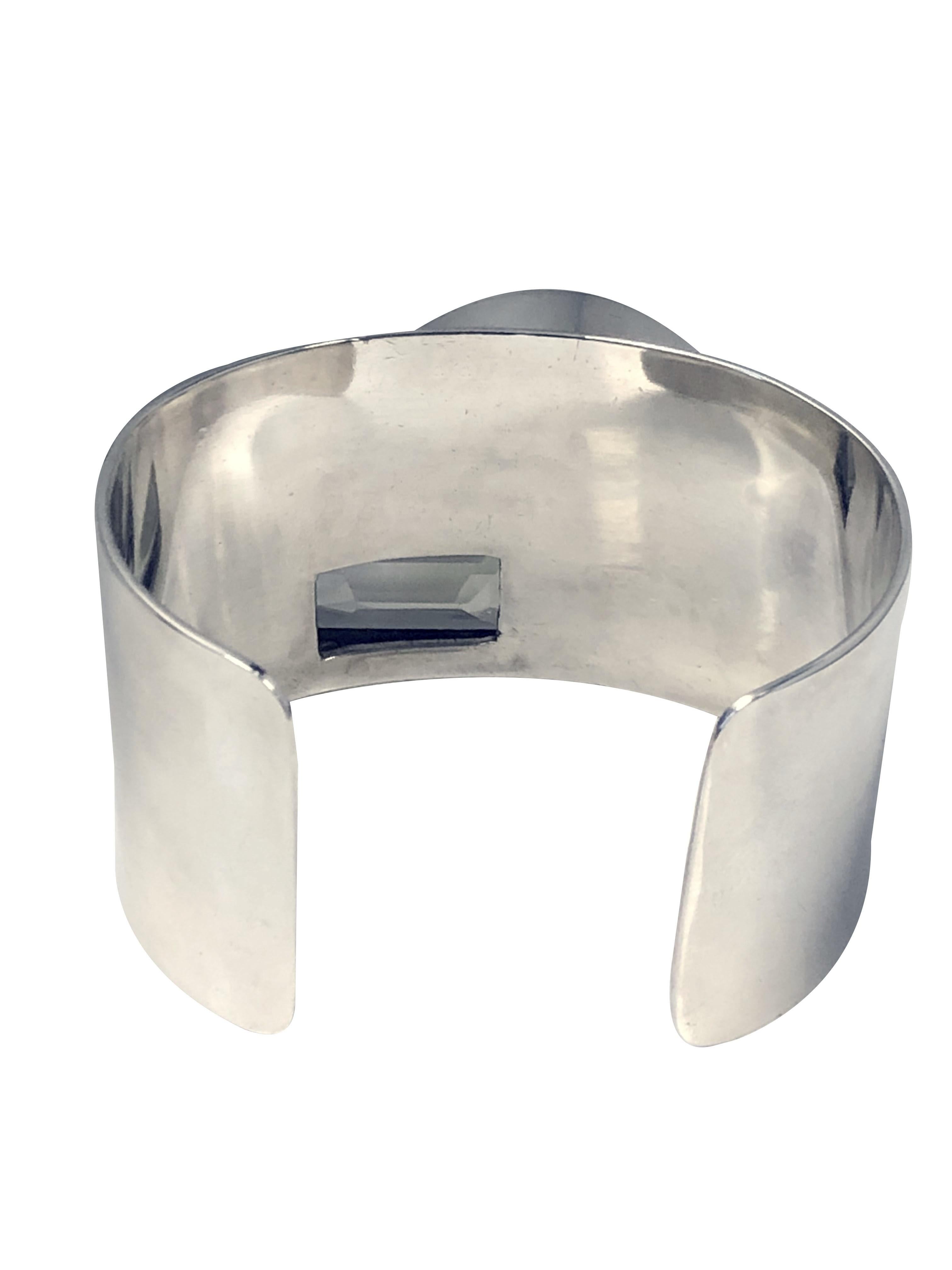 Circa 1980 M&J Savitt Mid Century Modern Style Sterling Silver Cuff Bracelet,  measuring 1 3/8 inches wide, 2 inches across the top and set with a step cut light Yellow Citrine. Nice Solid Gage Silver construction, Inside measurement of 6 1/2 inches