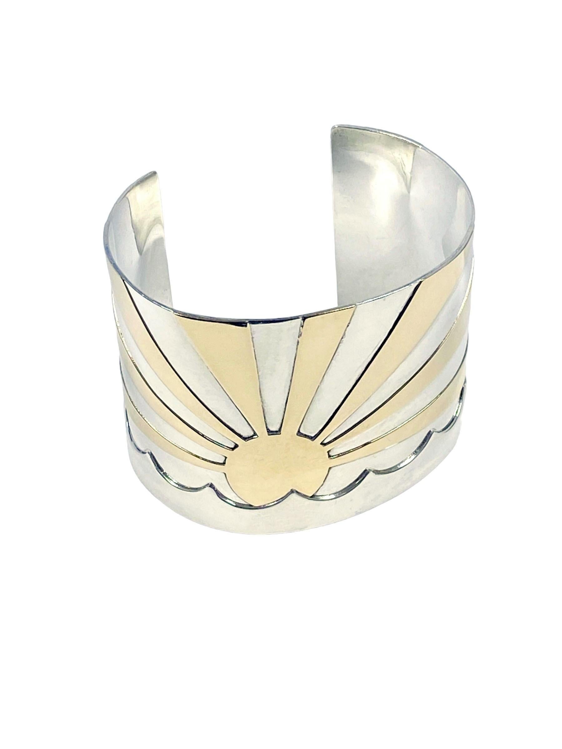 Circa 1970 Sunrise Cuff Bracelet by M.J. Savitt, measuring 1 5/8 inches wide,  14k Yellow Gold over Sterling Silver, 5 inches inside measurement with a 1 1/4 inches opening, plyable to fit a larger or smaller wrist.