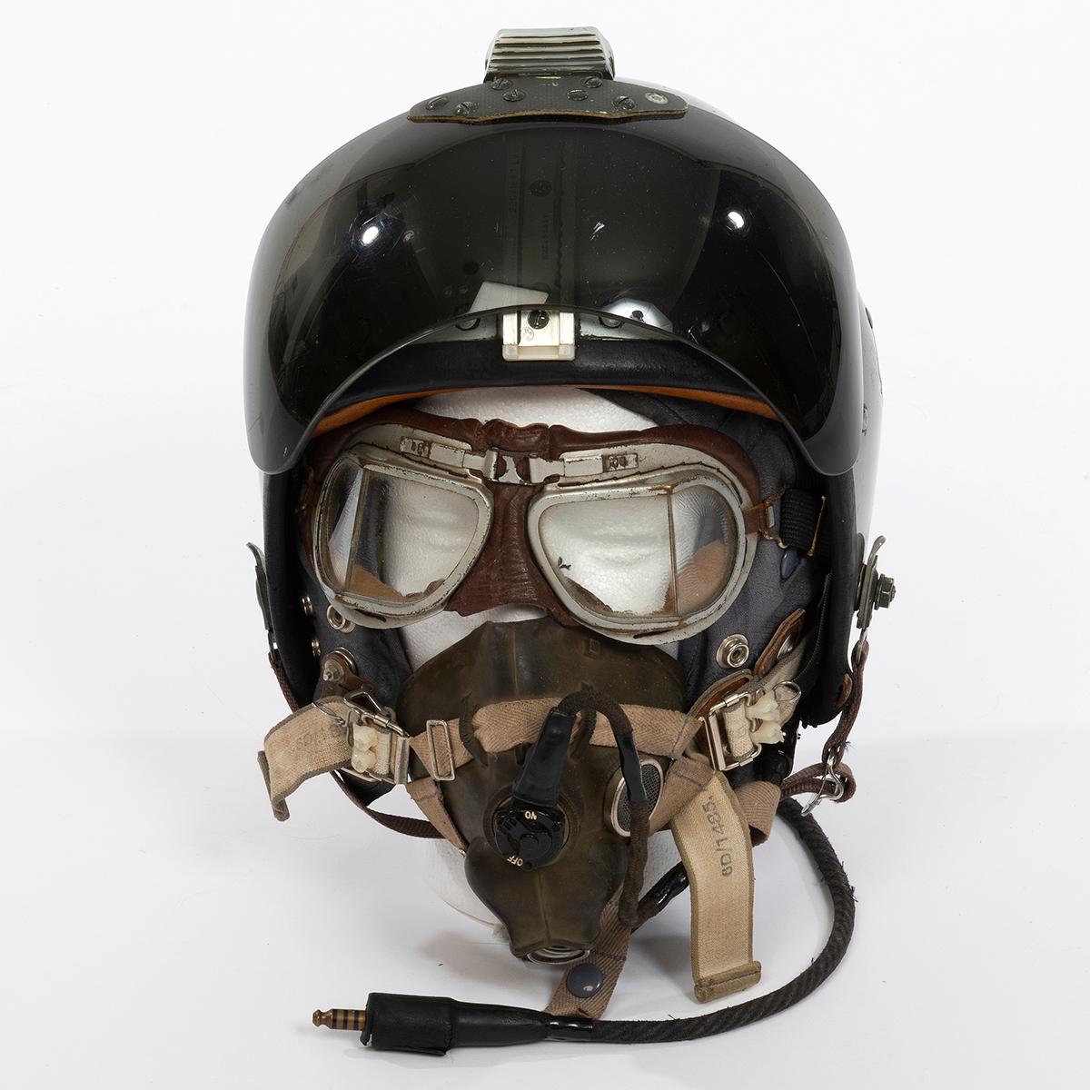 RAF Pilots flying helmet MK1A - 
Issued in the 1950’s, this was the first helmet 
produced for the RAF with a fixed (moveable) visor. 
It was issued to all front line pilots.

This is a classic early ‘bone dome’ (nickname 
given to the flying