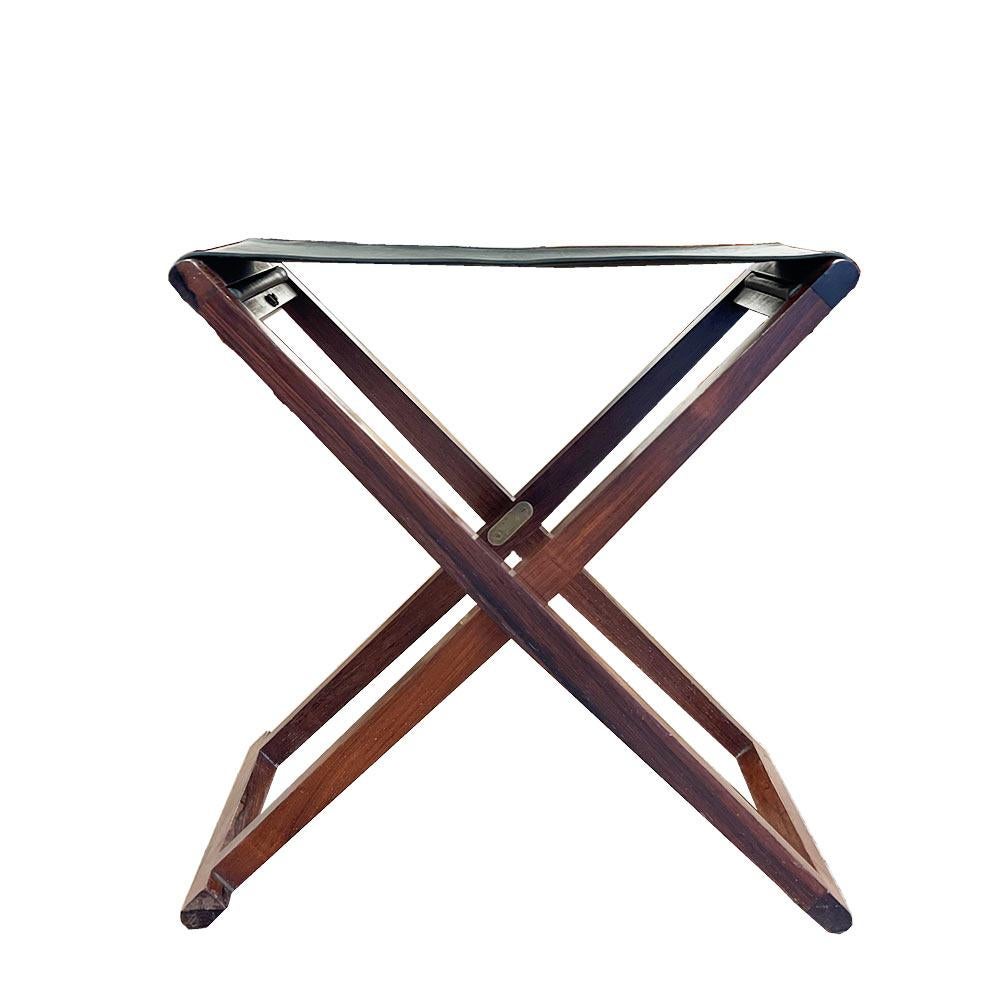 Very elegant stool, representative of the design of Mogens Koch, Danish architect and designer known for his timeless style, comfort and functionality in the design of his products. Model No. MK-30 foldable stool offers a very aesthetic shape and a