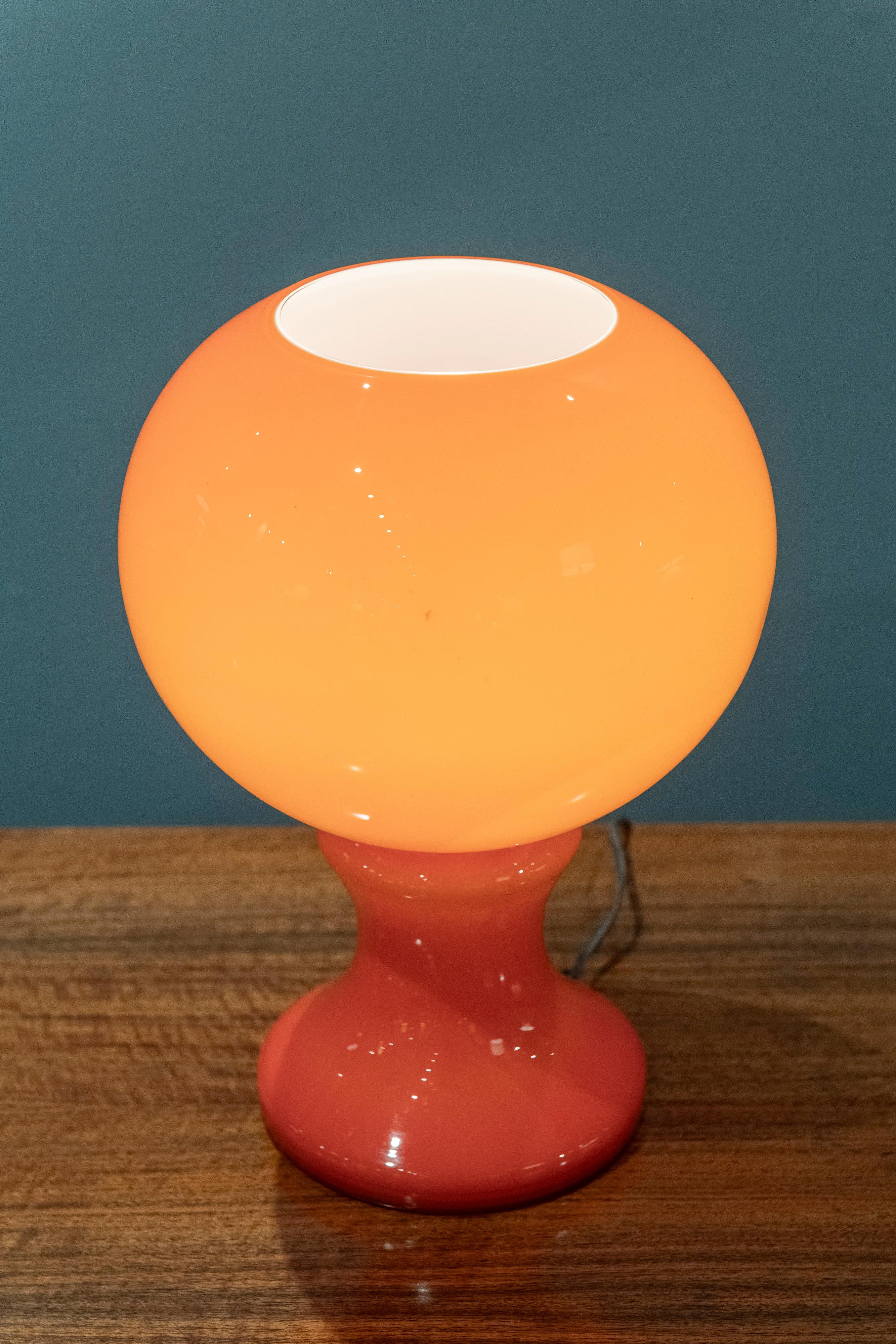 Ingo Maurer design blown glass table lamp, Germany. Model ML32 eye catching form and color seldom seen. In very good original condition and works as it should.