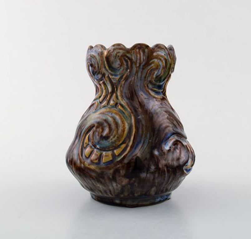 Møller & Bøgely, Denmark. Art Nouveau pottery vase of glazed ceramics, circa 1920s.
Large Danish private collection of Møller & Bøgely ceramics in stock.
In very good condition.
Measures: 12.5 cm x 11.5 cm.
Stamped.