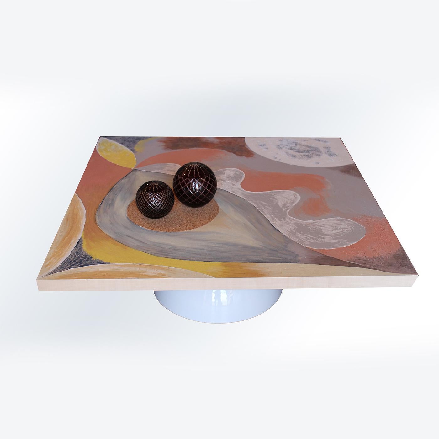 Brimming with artistic allure, this superb table was designed in 2019 by Mascia Meccani. The square wooden top features a maple finish and boasts abstract, mixed-media decorations that enchant with the sophistication of their earthy and pastel