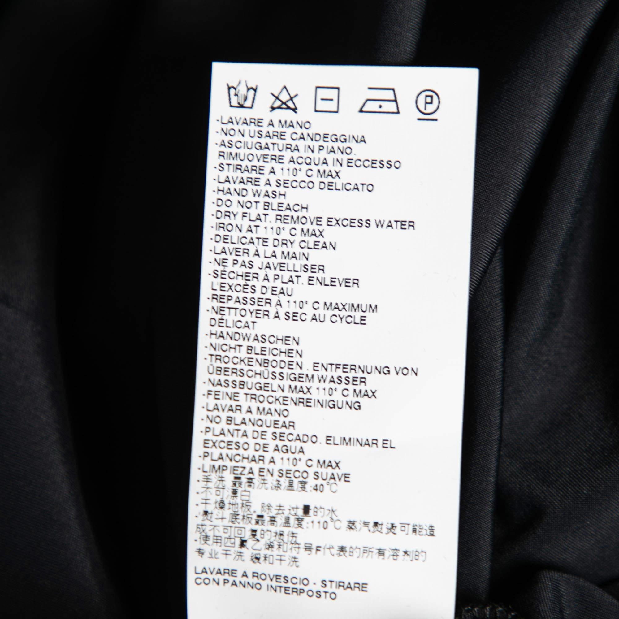 MM6 Maison Margiela - Body a manica lunga in jersey nero con dettaglio overlay M. I. in vendita 1