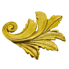 MMA 1993 signed vintage gold plated designer lead brooch