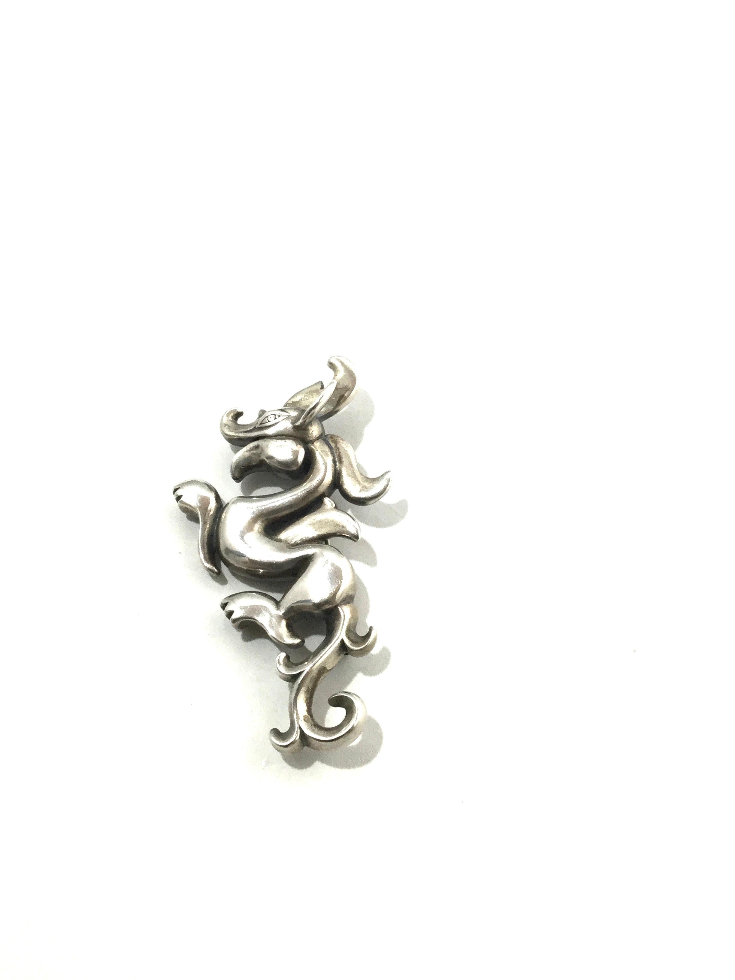 MMA Metropolitan Museum Sterling Silver Dragon Pin Pendant

This is a wonderful stering silver dragon pin pendant by MMA.

Measurements: Pin/Pendant measures 2-3/4 long, 1 inch in width.

Weight: 24.7 g / 15.9 dwt

Condition: In good condition with