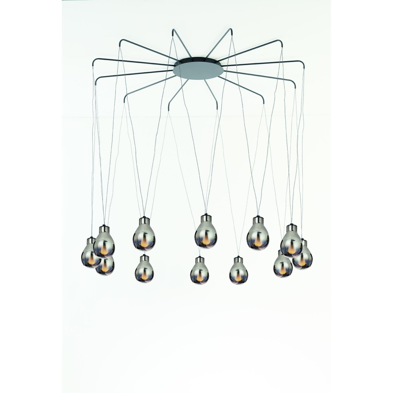 MMM Rain 12 Fumè Lámpara Colgante de Cristal Metálico by MM Lampadari
Dimensiones: P 145 x An 145 x Al 130 cm. 
Materiales: Vidrio y metal.

Todas nuestras lámparas pueden cablearse según cada país. Si se vende a EE.UU., se cableará para ese país,