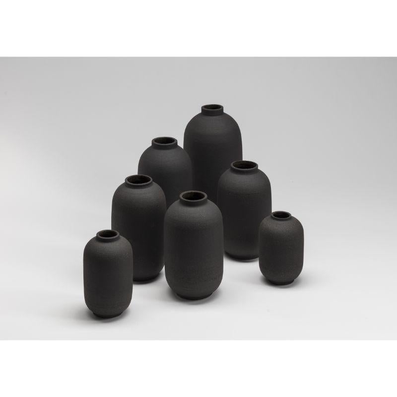 Mn L Small Vase by Josefina Munoz
Mn LARGE collection
Dimensions:H20 X ?12 cm
Material: Ceramics (Black Sandstone and Transparent Enamel) 

Available in: Medium, and Big. 

Ceramic handcrafted vases, glazed inside. This pieces of pure and
